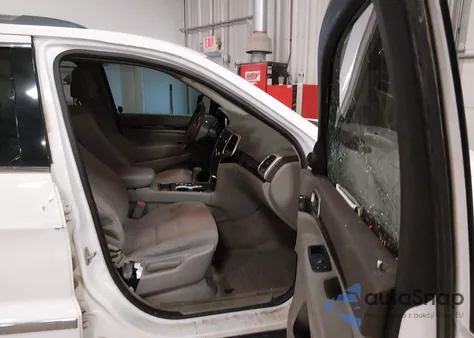 2013 Jeep Grand Cherokee Laredo z USA, uszkodzony, nr VIN 1C4RJEAG2DC588176